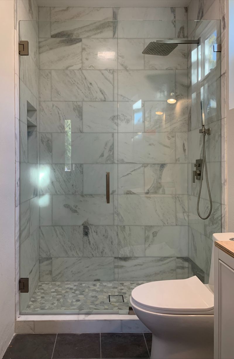 Seven-foot-tall shower door and inline panel in Encinitas