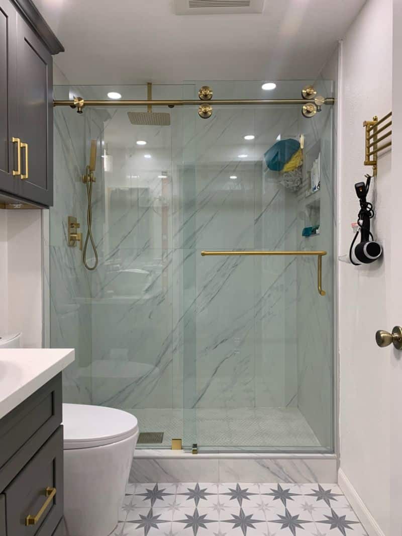 Euroglide shower enclosure with Timeless Brass hardware in Escondido