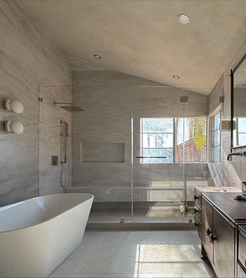 Opti-White low-iron multi-panel shower enclosure with half-inch support glass installed in Laguna Niguel