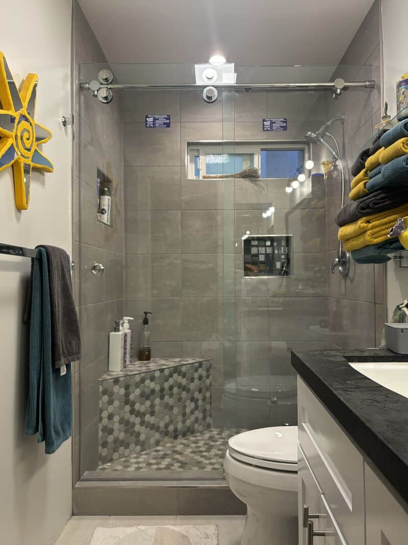 Euroglide sliding frameless shower enclosure treated with EnduroShield in Long Beach