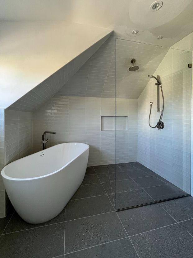 Large 171-pound fixed shower splash panel in a Los Angeles wet room