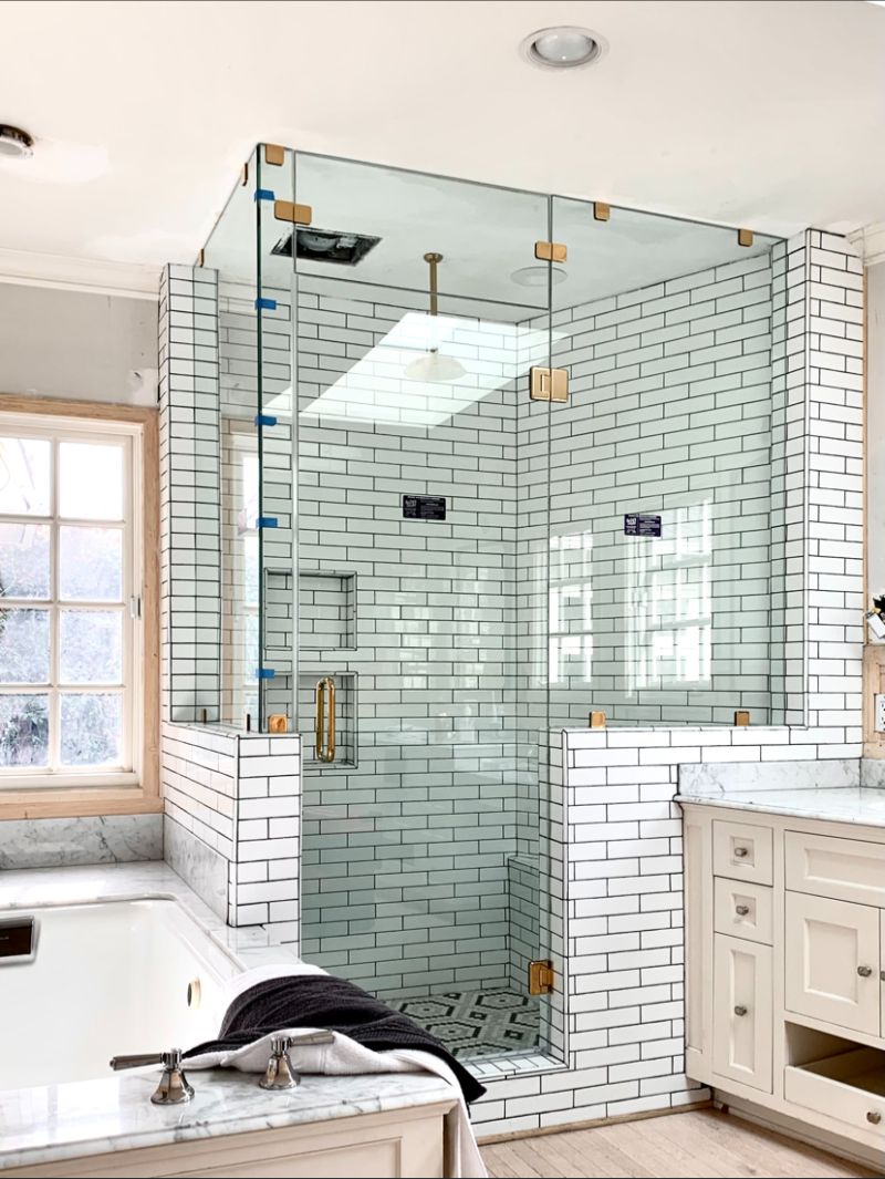 Floor-to-ceiling multi-panel frameless enclosure on pony walls in Hollywood, Los Angeles
