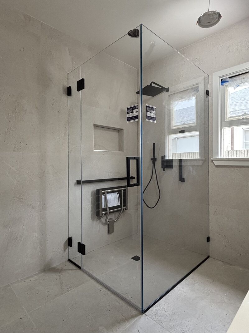 Opti-White low-iron frameless corner enclosure with a panel over 170 pounds in Los Angeles