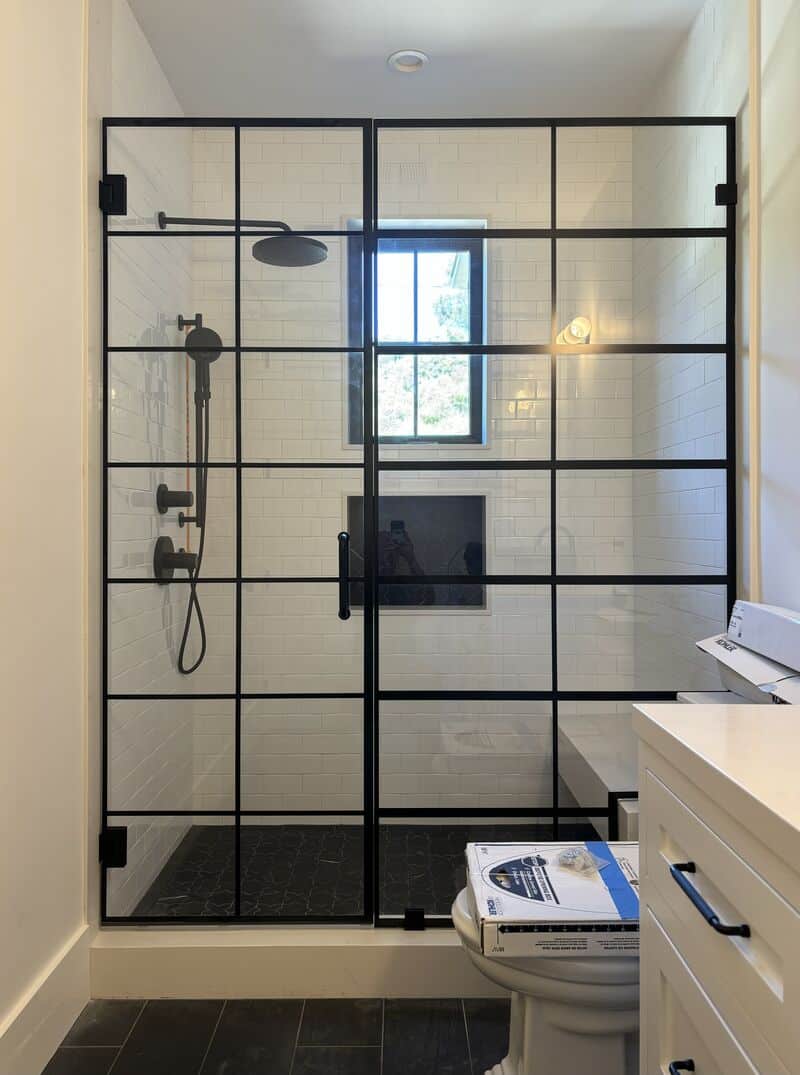 Half-inch Starphire grid-glass shower door and inline panel in Studio City, Los Angeles