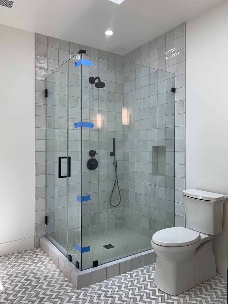 All-half-inch frameless DP90 corner shower enclosure weighing 175 pounds in Manhattan Beach