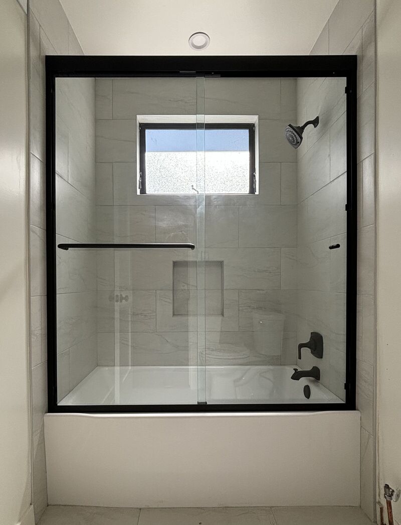 Three-eighths-inch bypass sliding glass enclosure on acrylic tub in Manhattan Beach