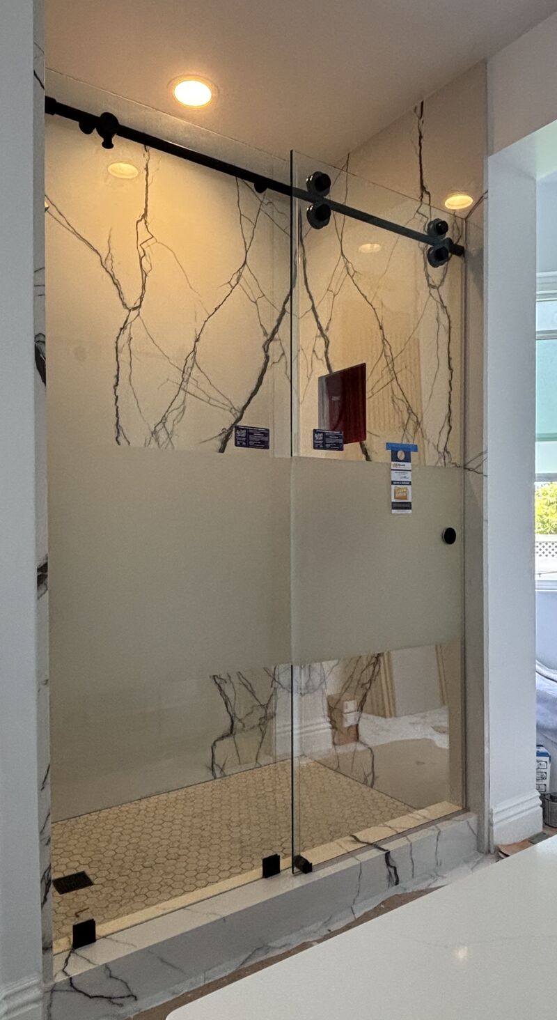 Euroglide sliding shower enclosure with frosted privacy band in Manhattan Beach