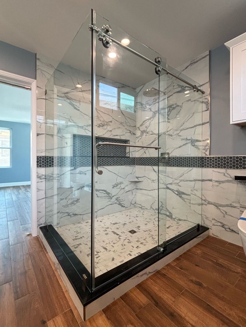 Brushed-nickel Euroglide 90-degree sliding shower enclosure weighing more than 142 pounds in Newport Beach