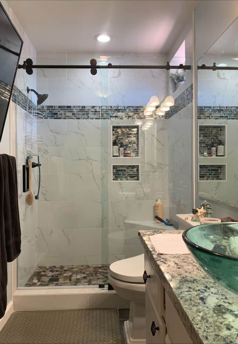 Matte-black Euroglide sliding shower enclosure in Oceanside