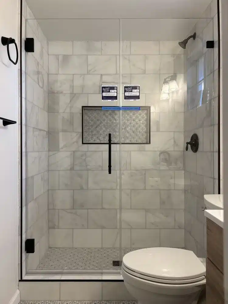 Opti-White low-iron frameless door and inline panel in San Clemente