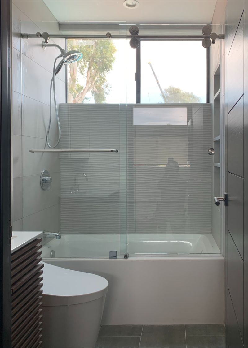 Euroglide sliding glass enclosure on an acrylic tub in Redondo Beach