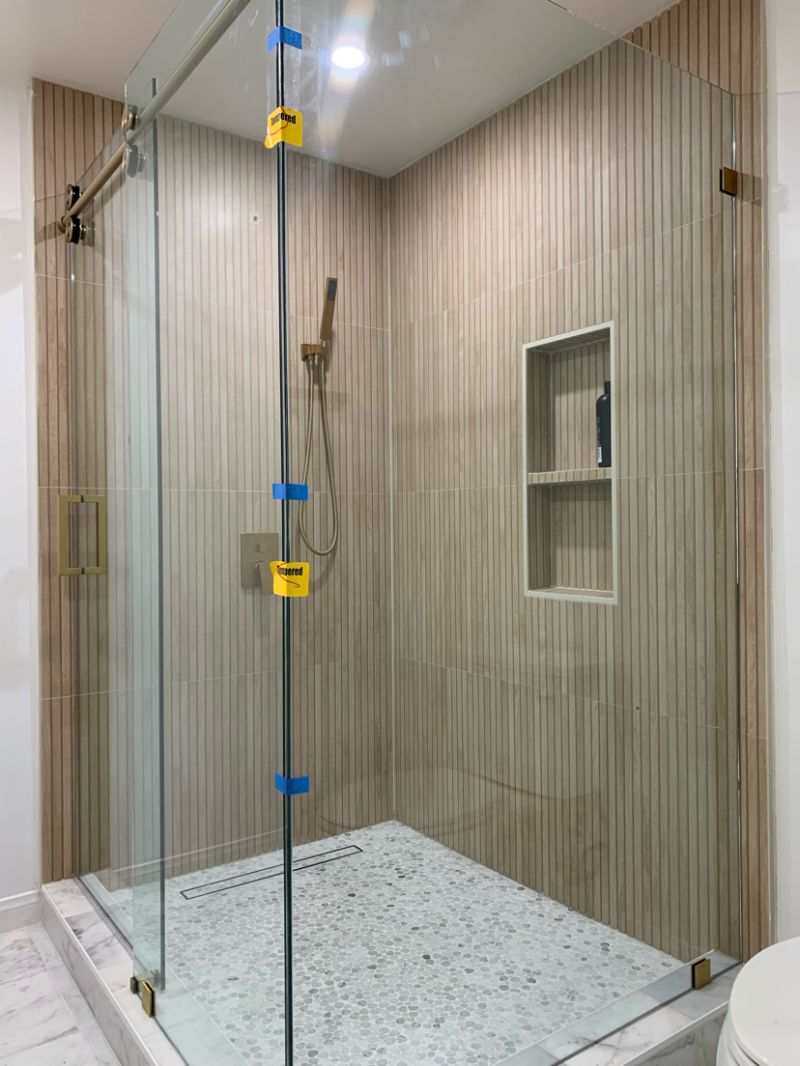 Corner Euroglide shower with Timeless brass hardware in Redondo Beach