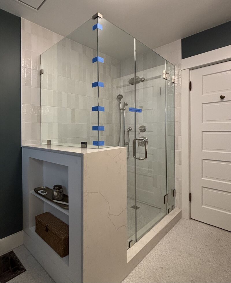 Pony-wall corner shower with US Horizon polished-nickel hardware in San Diego