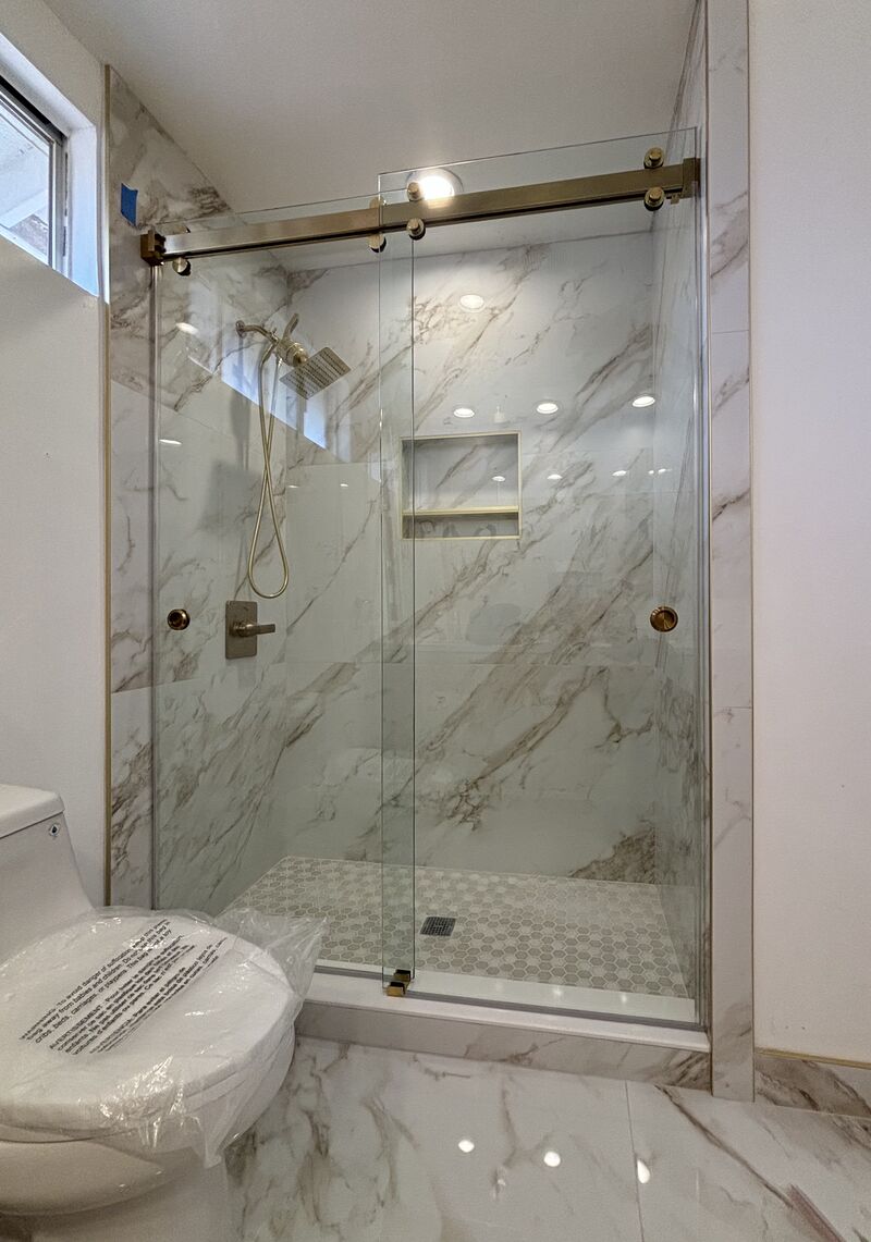 Brushed-gold double Euroglide shower enclosure in Torrance