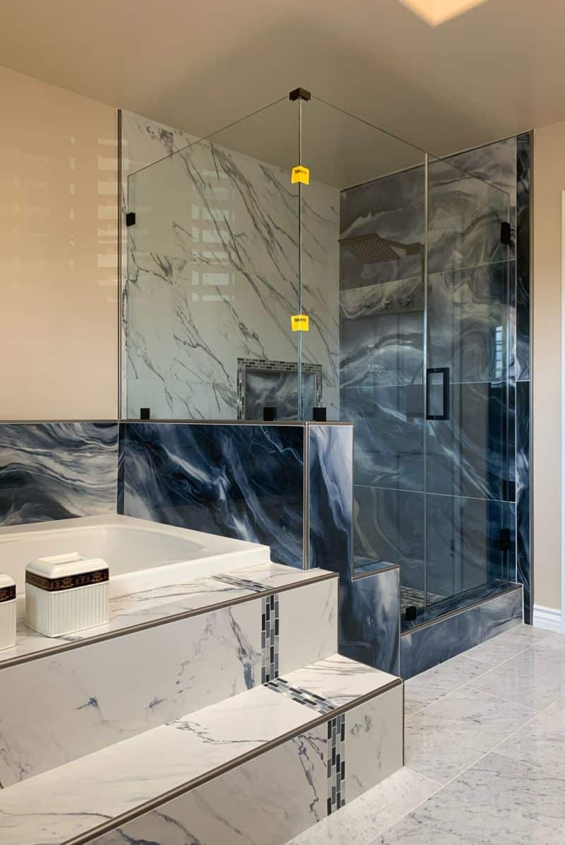 Corner shower glass with pony-wall and bench notches in Torrance